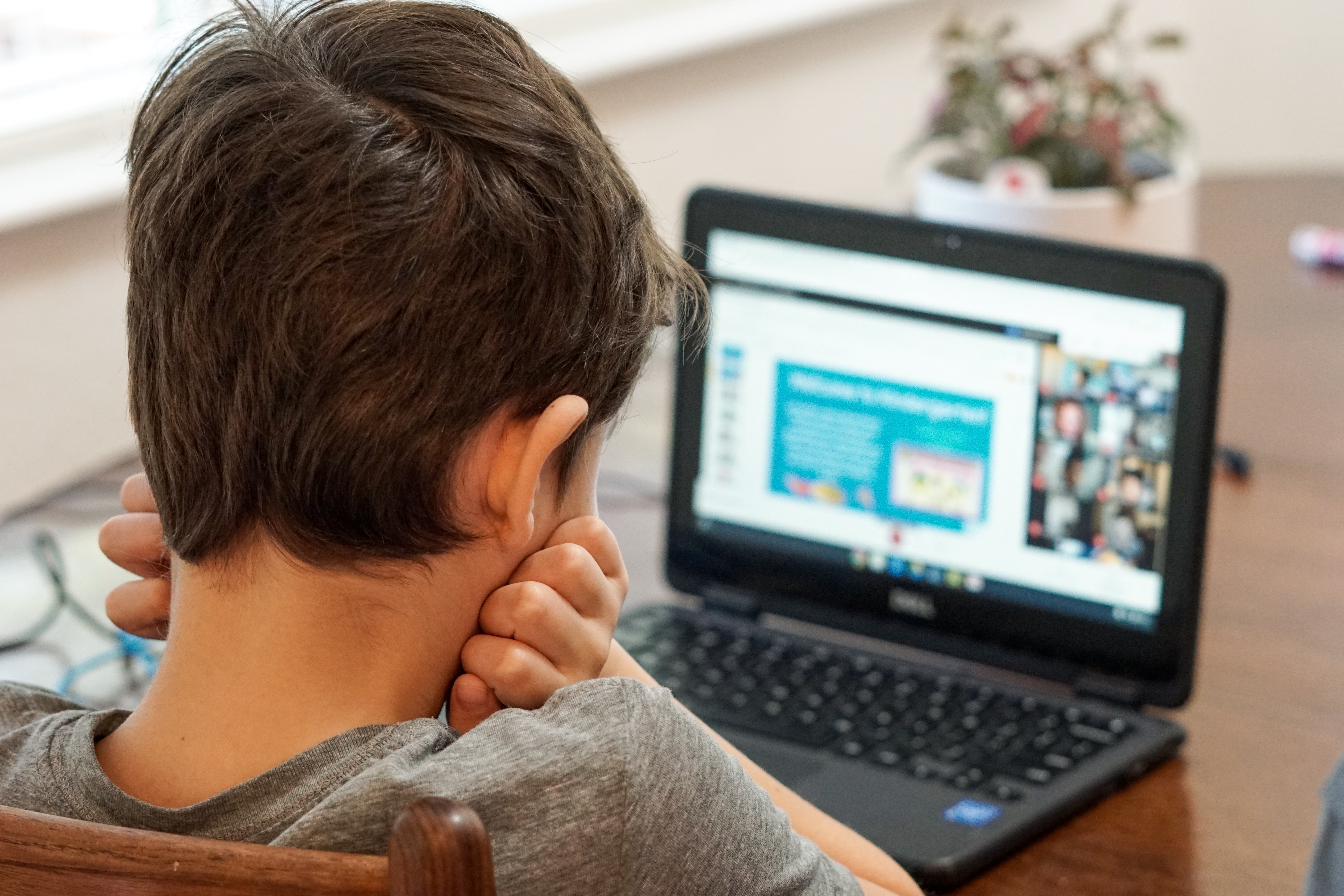 A mother sees his son struggle and in tears on learning his lessons on virtual learning.