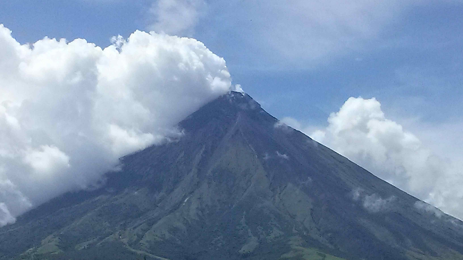 Mayon is spewing white smoke, alerting Albay.