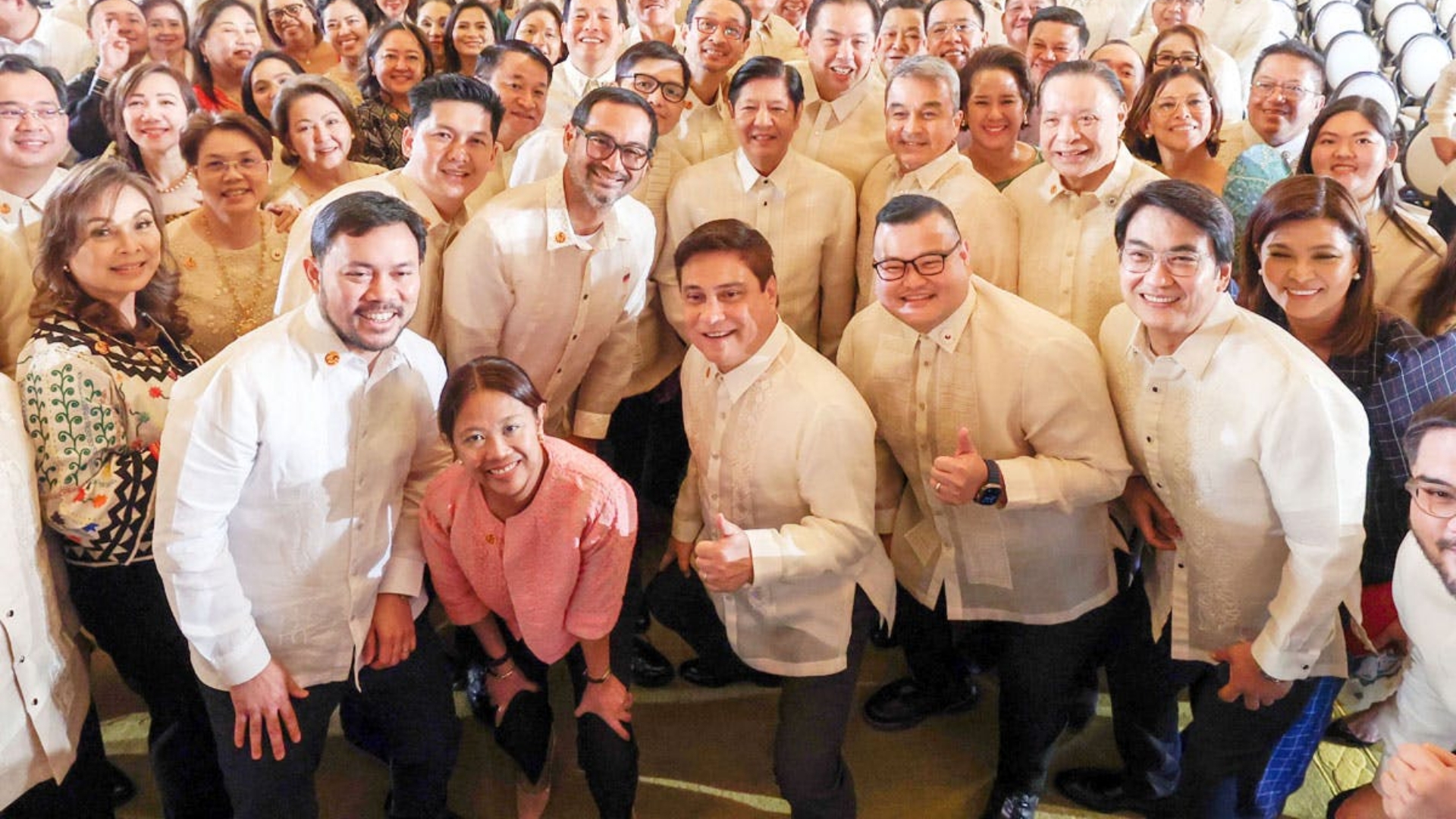 Signing the extended Centenarian Law is Marcos