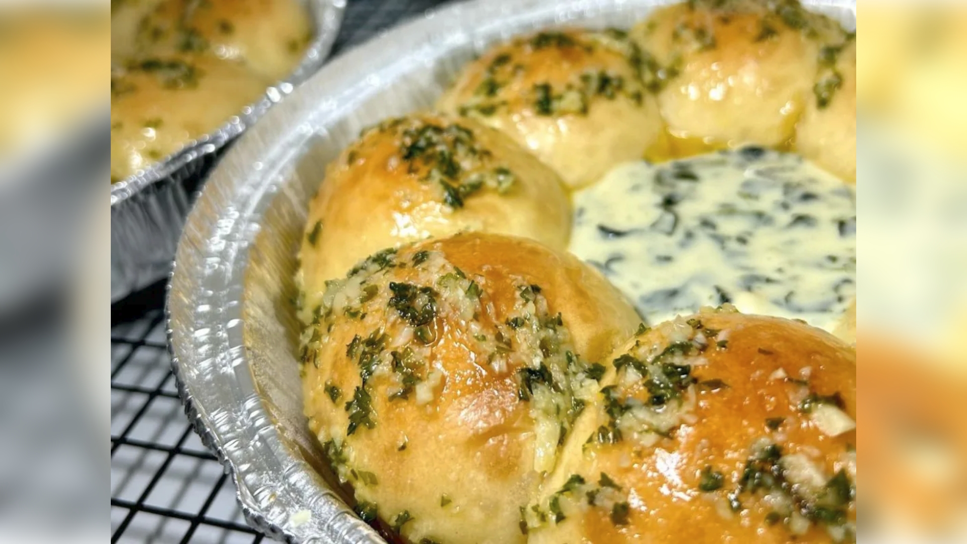 Rolls with garlic and herb and creamy spinach dip are currently available at the Capitol Bakery.