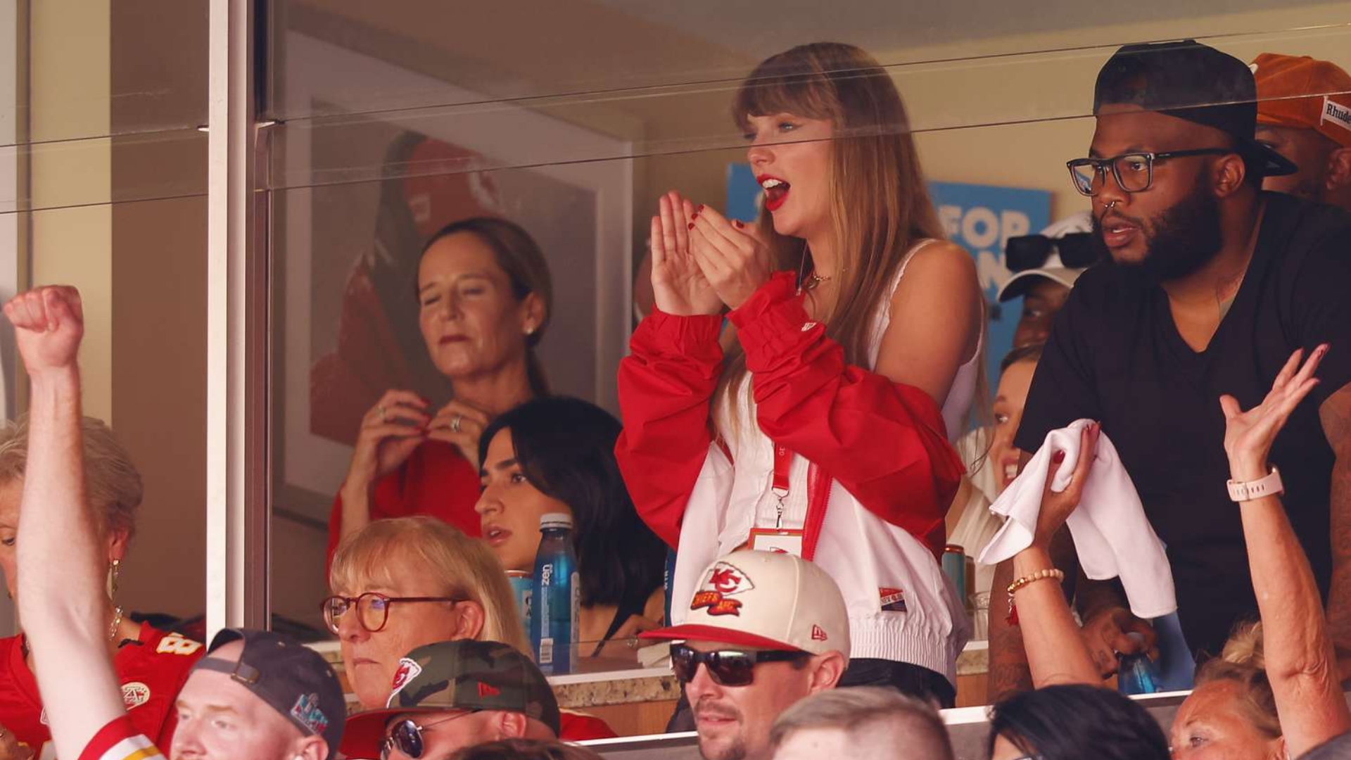 Taylor Swift having a great time with Travis Kelce's Mother at Kansas City Chiefs Game